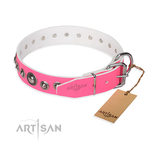 Leather dog collar made of flexible material with durable decorations